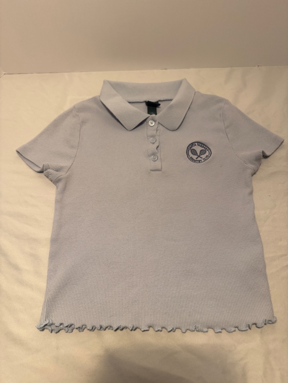 Darling Wild Fable Pale Blue Ribbed Polo with Tennis Emblem